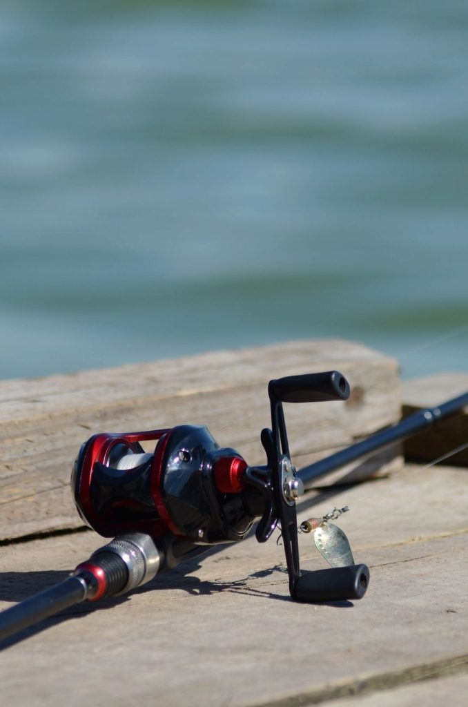 fishing rod on wooden pier